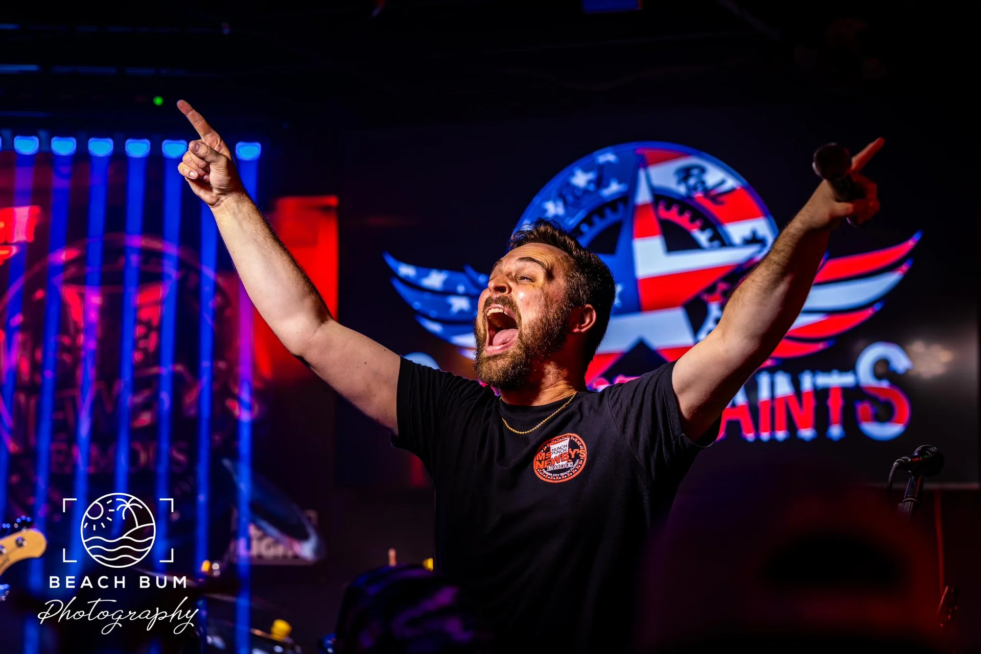 Mason arms raised at Ms Newbys